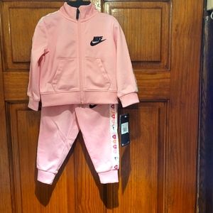Pink 2 piece nike suit